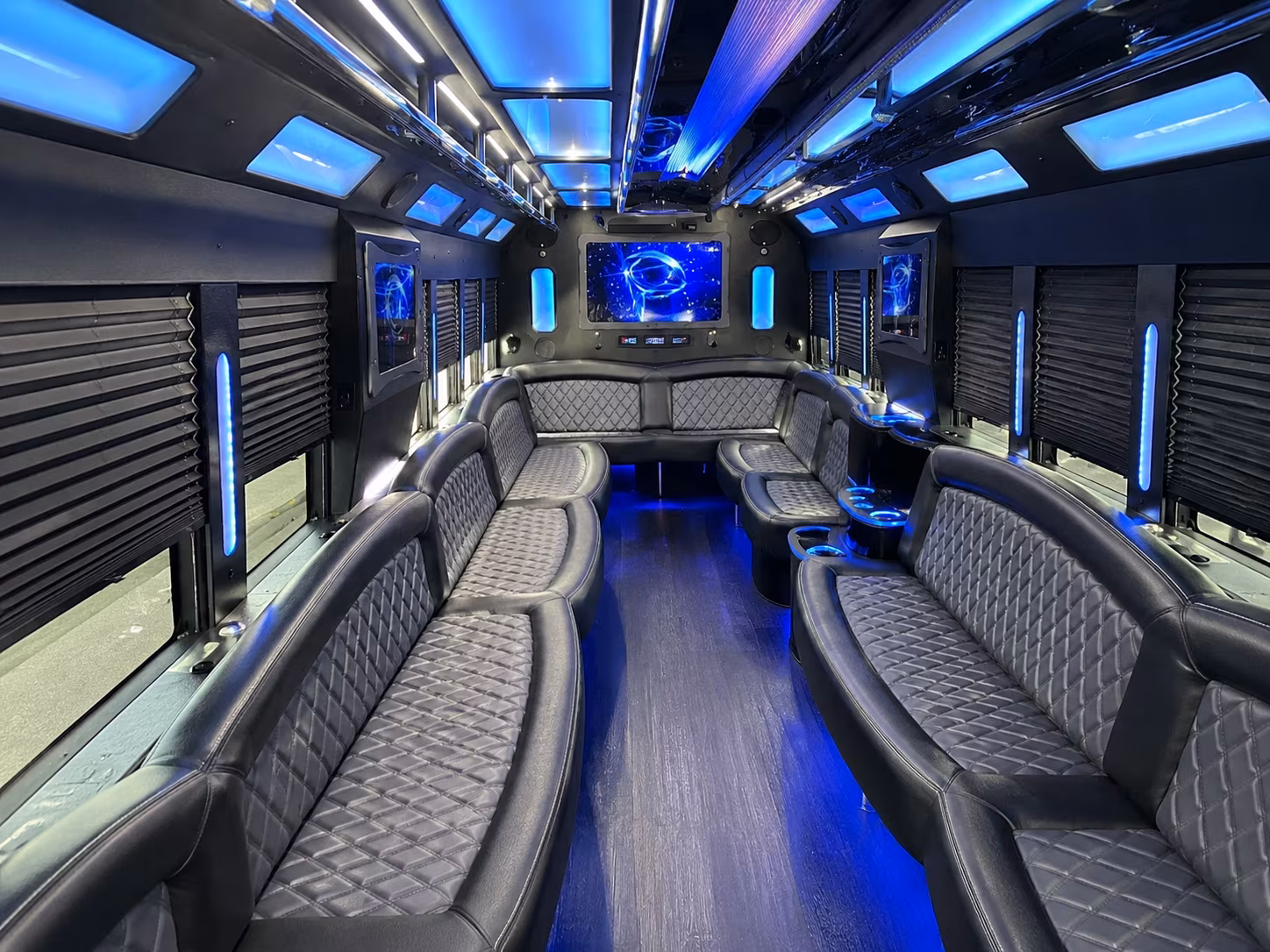 Wedding guests seated inside a party bus serving Mesquite